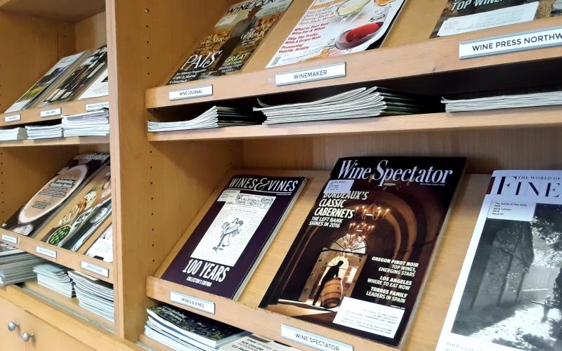 Angled image of the periodical shelves showing about 10 magazine covers