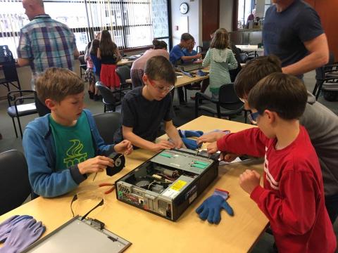 children taking apart computers